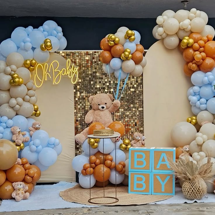Baby shower en tonos celeste y naranja